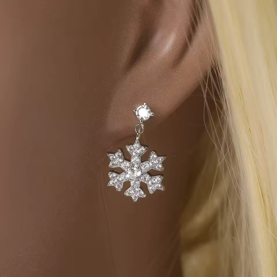Boucles d`oreilles en flocon de neige