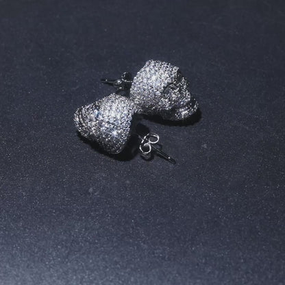 Boucles d`oreilles tête de mort